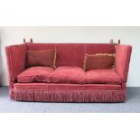 A three-seater Knole settee, with three cushions and two cushions covers, 190cm wide