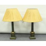 A pair of wooden table lamps and shades