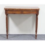 A mahogany D-shaped tea table with panelled frieze on turned reeded legs, 88cm wide/Provenance: