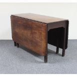 A mahogany centre section of a dining table on square moulded and tapering legs, with rounded