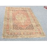 A Feraghan prayer rug with geometric field and borders, 180cm x 130cm