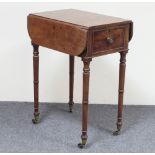 A small mahogany Pembroke work table, circa 1820, the two-flap top above a single drawer on ring