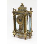 A French gilt brass and champlevé enamel four-glass striking mantel clock, circa 1890, with turned