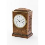 A Regency figured walnut quarter-strike ting-tang bracket clock, the rectangular case with stepped