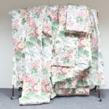 Four pairs of curtains, floral glazed cotton, 285cm drops, various widths with three pelmets, 186cm,