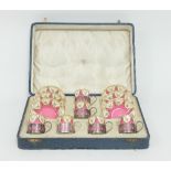 A Royal Worcester coffee set, the cans with silver mounts, circa 1924, the mounts Birmingham 1924,