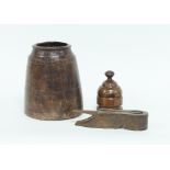 An 18th Century treen jar and cover, 15cm high, a treen storage jar, 35cm high and a wooden ball