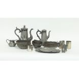 A collection of pewter pots,