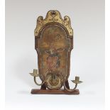 A walnut and parcel gilt wall sconce,