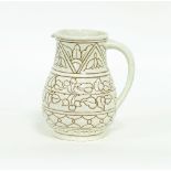 A Bursley Ware jug by Charlotte Rhead,