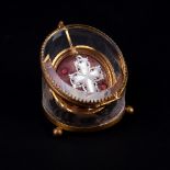 An engraved glass watchstand with gilt metal mounts, 8cm high,