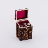 A Regency tortoiseshell necessaire of knife box form with serpentine front and ivory banding,