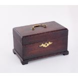 A George III mahogany rectangular tea caddy with brass handle to the top and escutcheon plate to