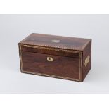 A Regency rosewood brass bound tea caddy with fitted interior,