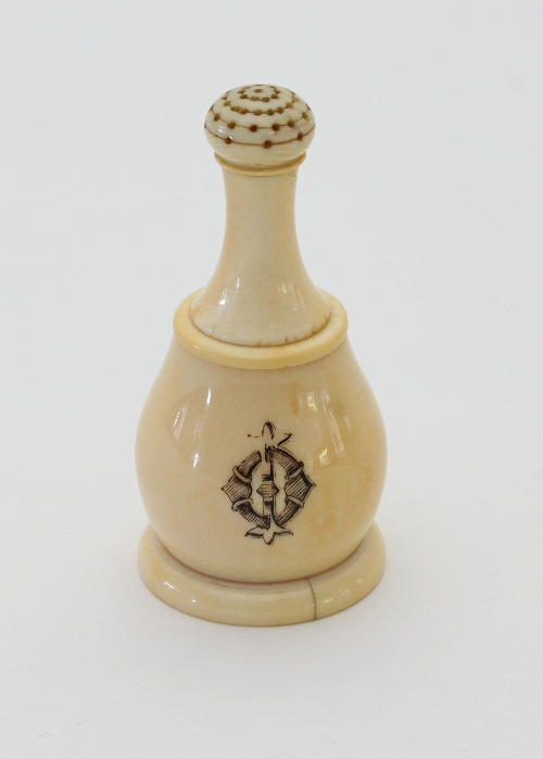 An ivory water sprinkler with pierced and turned cover, crested, 8.