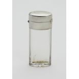 A silver mounted scent bottle, marks rubbed, with hinged cover enclosing a glass stopper, 9.