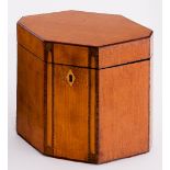 A late 18th Century satinwood tea caddy of octagonal form banded in tulipwood and inlaid arches to