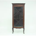 An Edwardian mahogany display cabinet on stand,