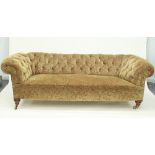 A Chesterfield sofa with button upholstery,