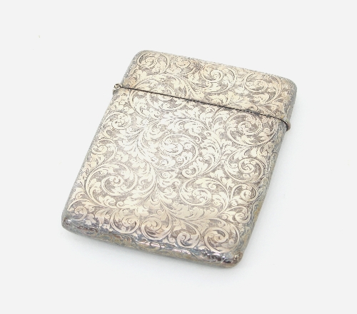 A silver card case, Birmingham 1891, engraved with foliate scroll work, 10.