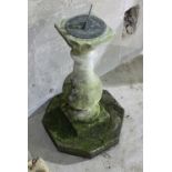 A sundial with baluster column support,