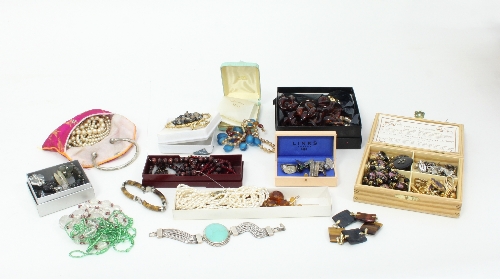 A quantity of costume jewellery to include a pair of silver cufflinks,