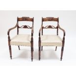 A pair of Regency mahogany armchairs,