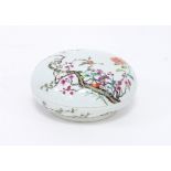 A Chinese famille rose box and cover painted with peonies and prunus, apocryphal Qianlong seal mark,