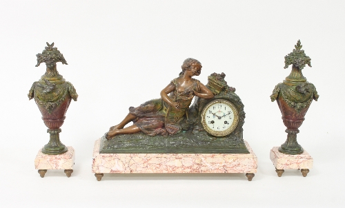A painted spelter clock set, the clock mounted a girl playing a harp, on a marble base, 35.