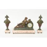 A painted spelter clock set, the clock mounted a girl playing a harp, on a marble base, 35.