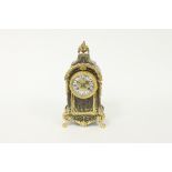 A 19th Century tortoiseshell and brass eight-day boulle type mantel clock,