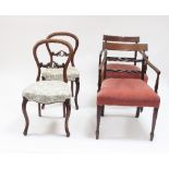 A pair of Victorian single chairs with pierced horizontal splat backs and upholstered seats and a