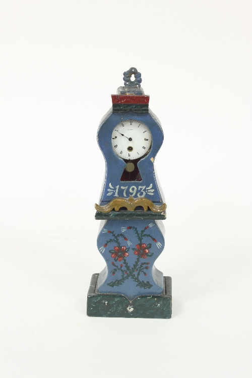 A miniature longcase clock, fitted a white enamel dial with Roman numerals signed Wilter,