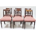 A set of six Regency mahogany dining chairs each with two triple and central quadruple upright