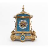 A late 19th Century French ormolu and porcelain mounted eight-day mantel clock,