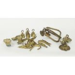 Six pairs of gilt metal curtain ties and chandelier fittings