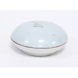 An incised blanc-de-chine circular box and cover, underglazed blue seal mark,