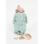 An Armand Marseille doll, the head broken, marked AM Germany, with sleepy eyes,