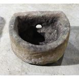 A small stone trough,