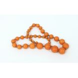 A necklace of thirty-six graduating spherical beads