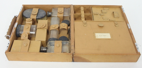 An Asprey leather dressing case, fitted with silver topped bottles, London 1939, initialled A L M - Image 2 of 2