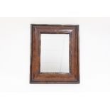 A William and Mary style oyster laburnum cushion framed wall mirror with rectangular plate and