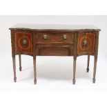 A late 18th Century sideboard fitted two central drawers and a concave cupboard to each side,