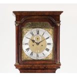 A mid 18th Century walnut eight-day longcase clock, by Samuel Marshall, London, the hood with turned