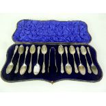 Twelve silver teaspoons, Walker & Hall, Sheffield 1905 and the matching tongs, cased,