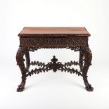 A pair of Anglo-Indian hardwood card tables (probably padouk),