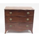 A George III mahogany chest, the rectangular top with moulded border,