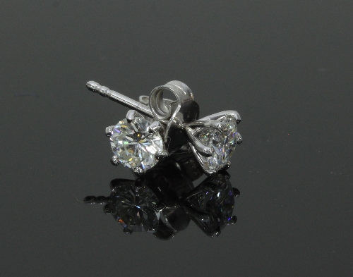 A pair of diamond ear studs,