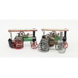 Two Mamod showman's engines, green, red and white painted and another Mamod traction engine