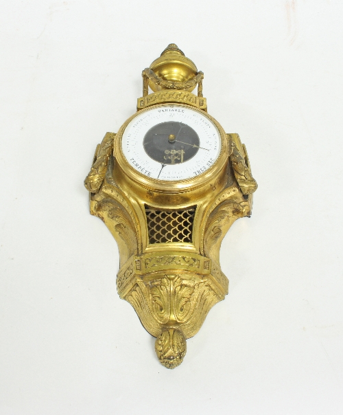 A French gilt metal cased barometer,